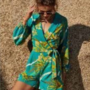 Tropical print romper. Casual/dressy you choose! Long sleeve tie belt,wrap look.